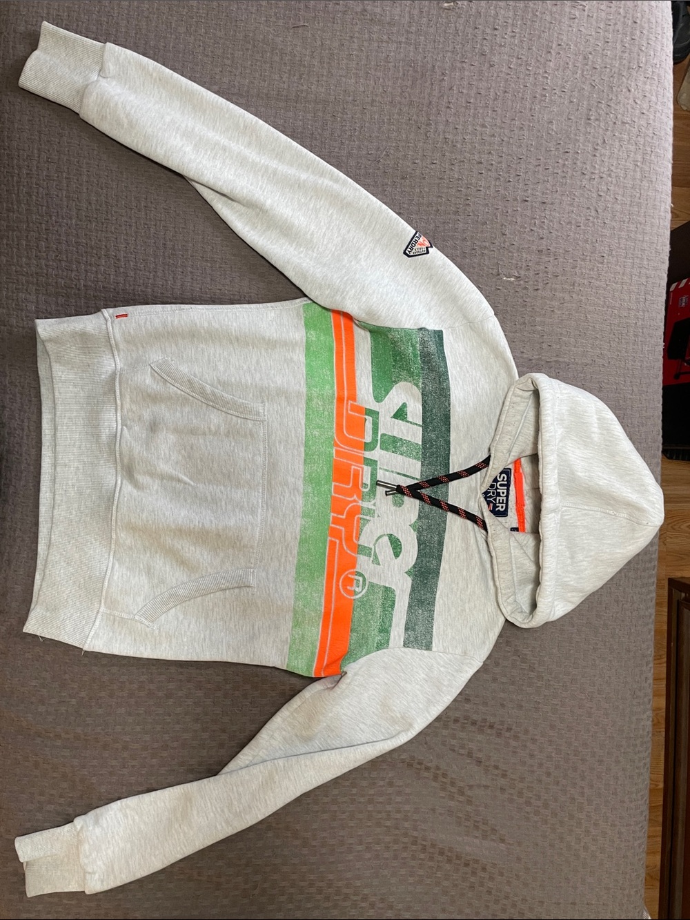 Superdry Cream V-Neck Sweater with Green and Orange Stripes